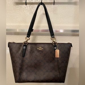 COACH Zip Top Tote In Signature Canvas